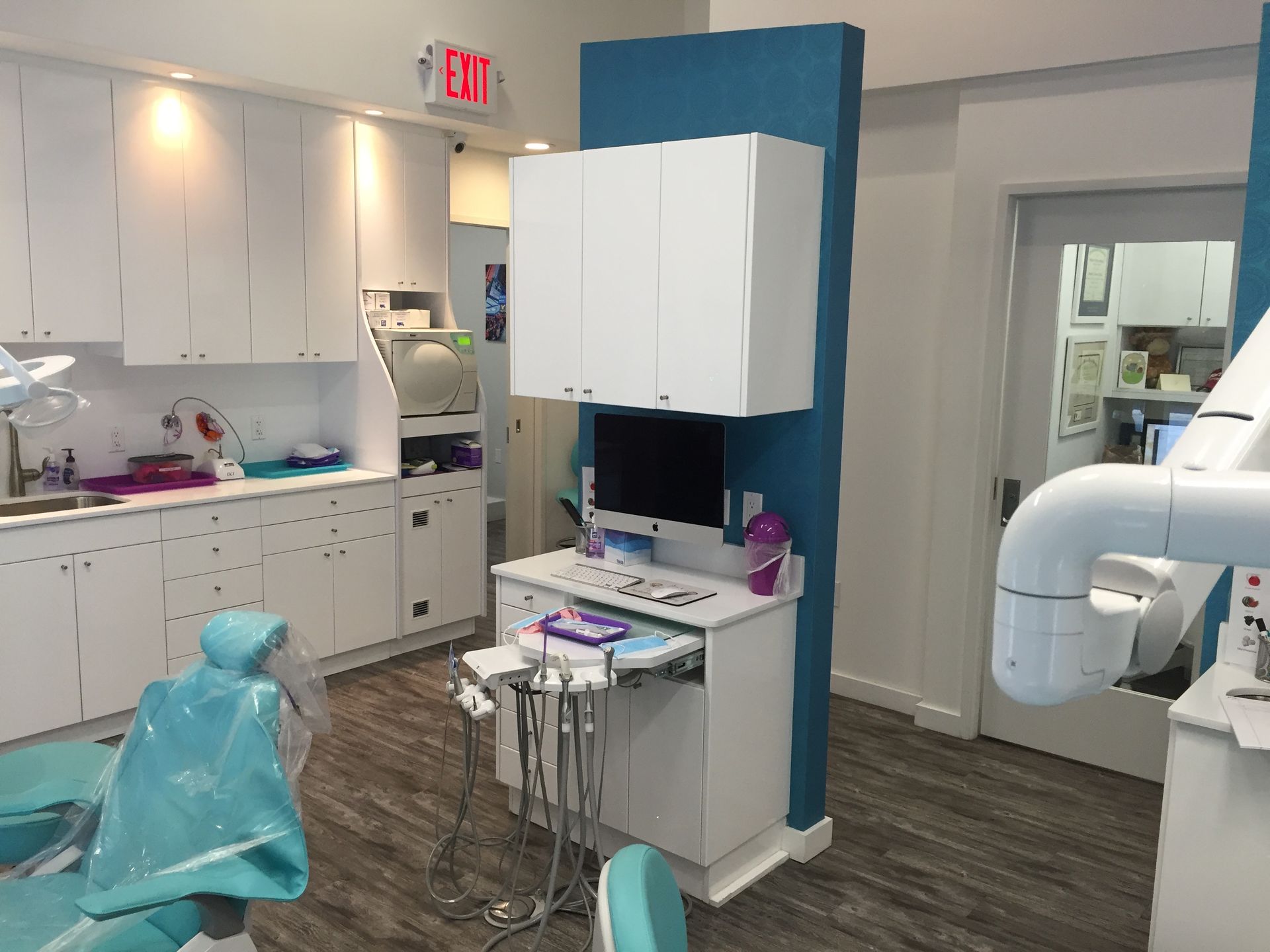 dental cabinet in the middle of the treatment area