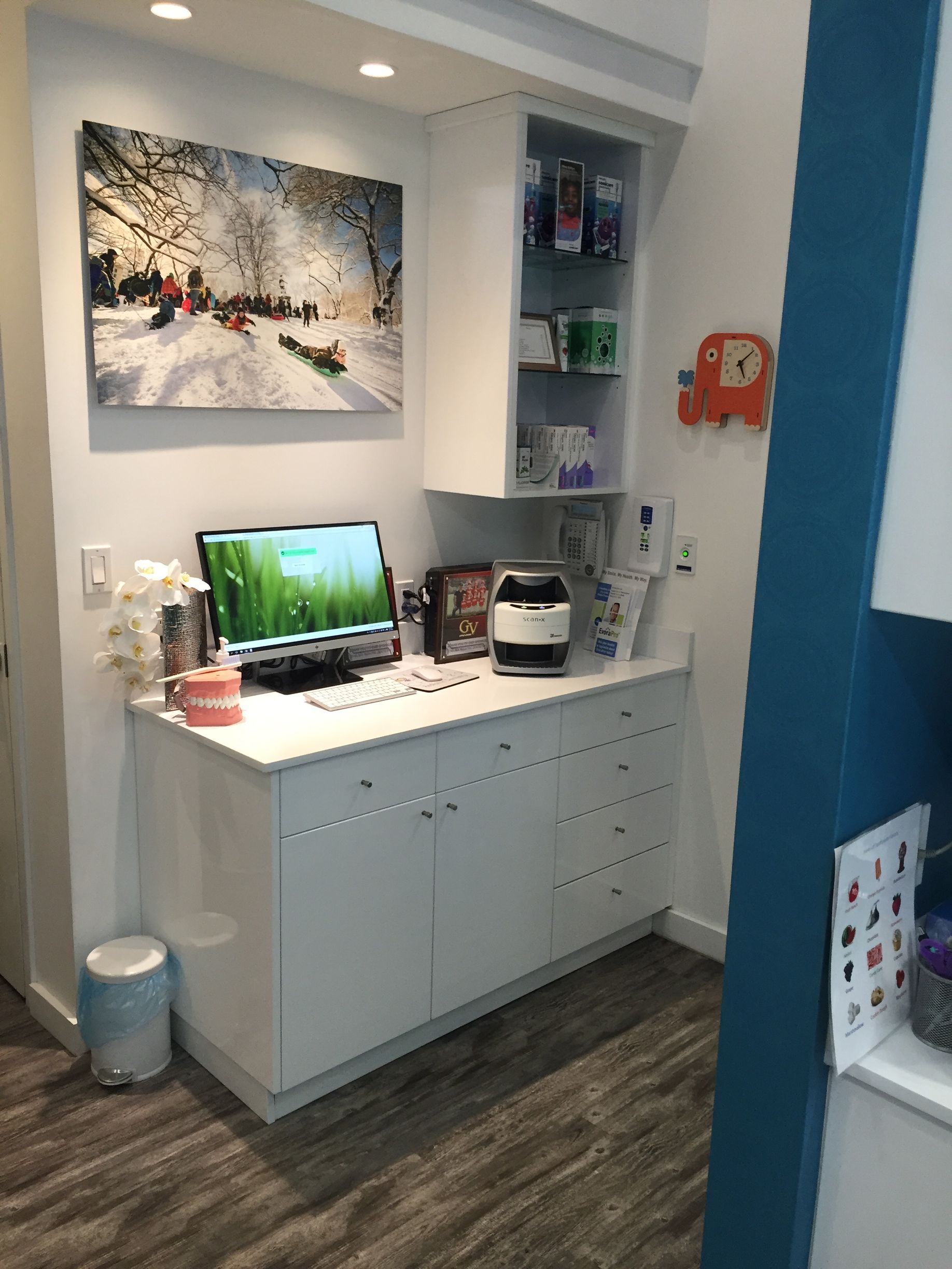 well-lit dental cabinet and desk