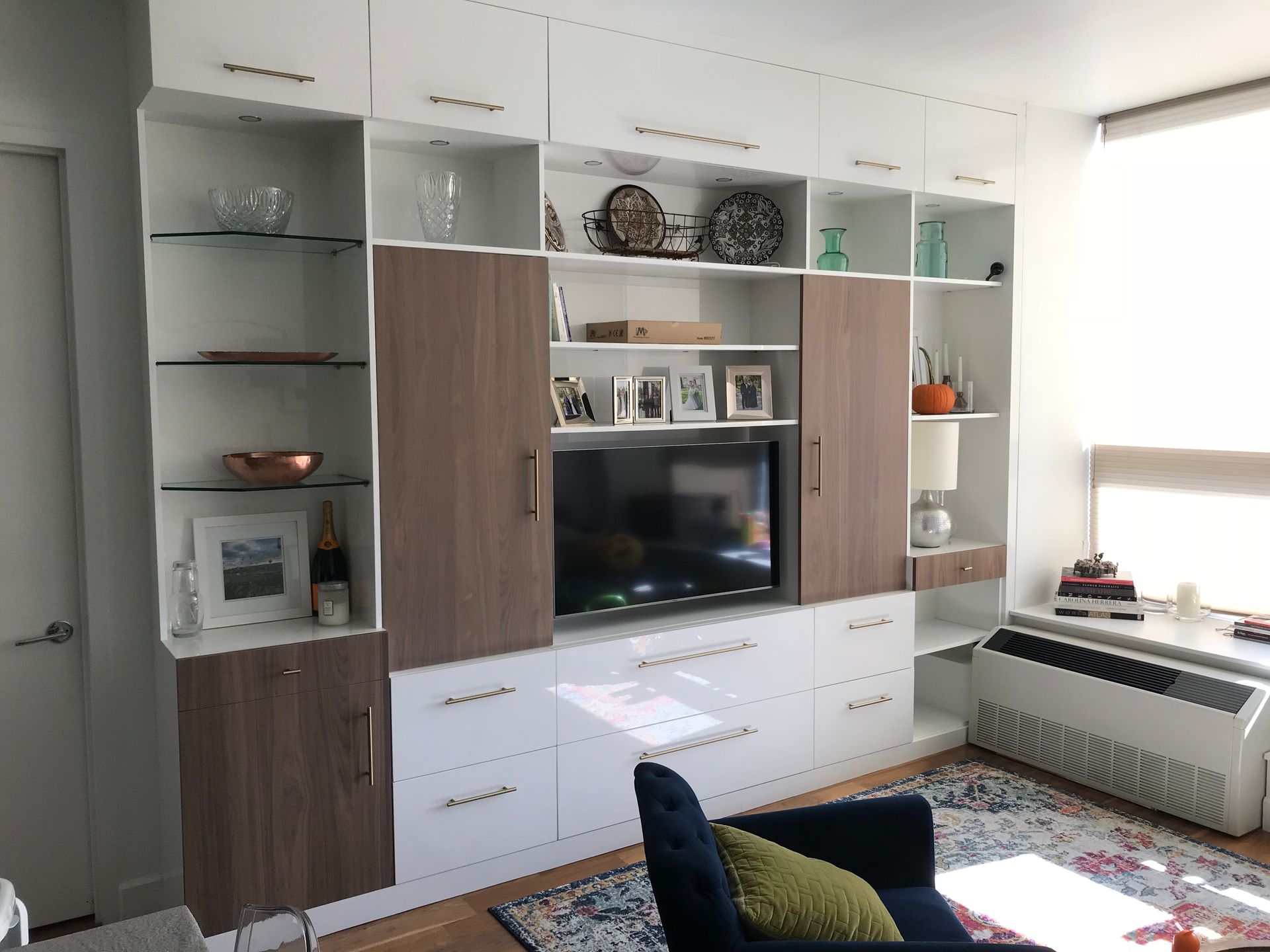 beautiful white and brown cabinet in the waiting area