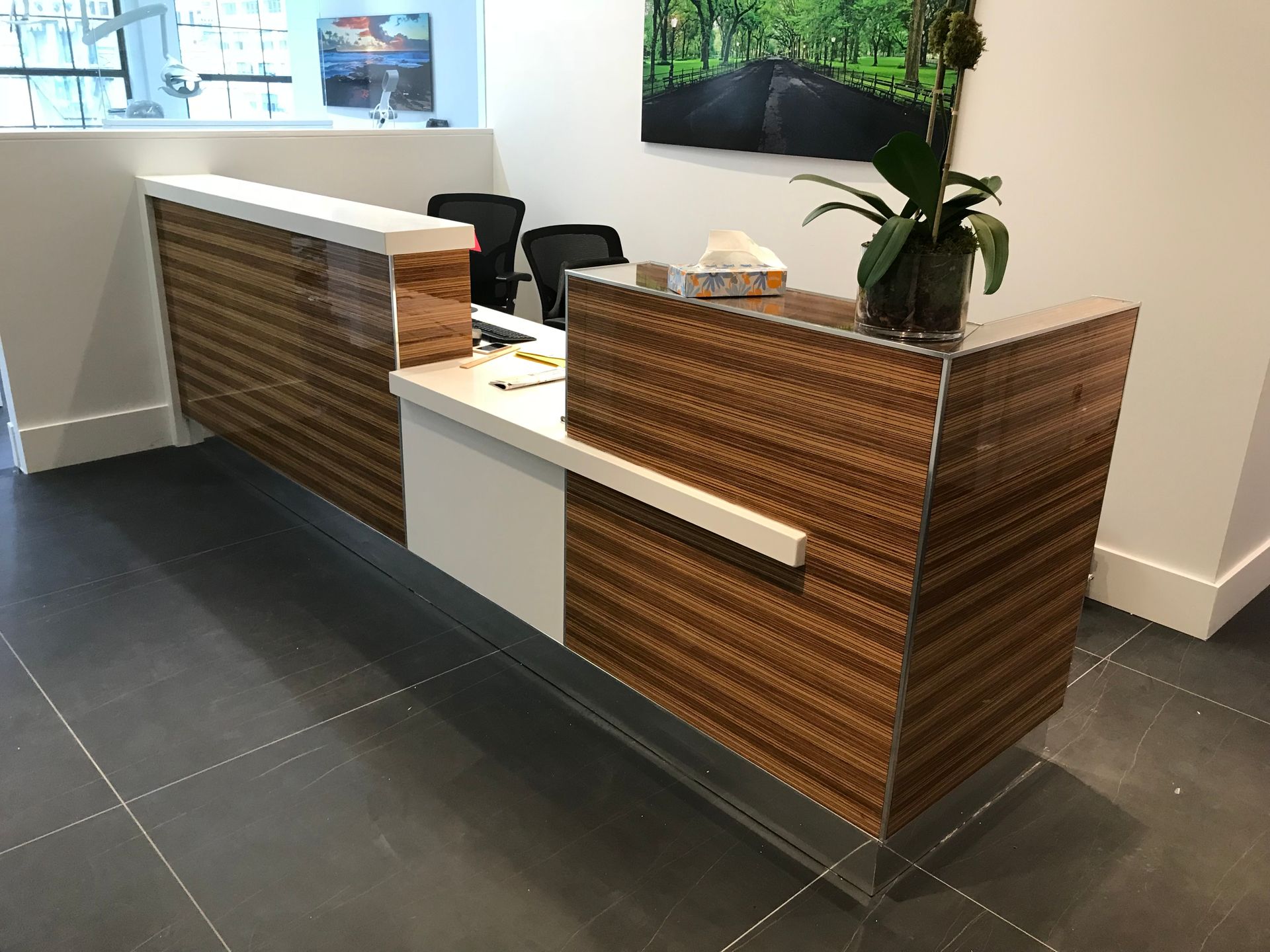 white and brown reception area in the dental clinic