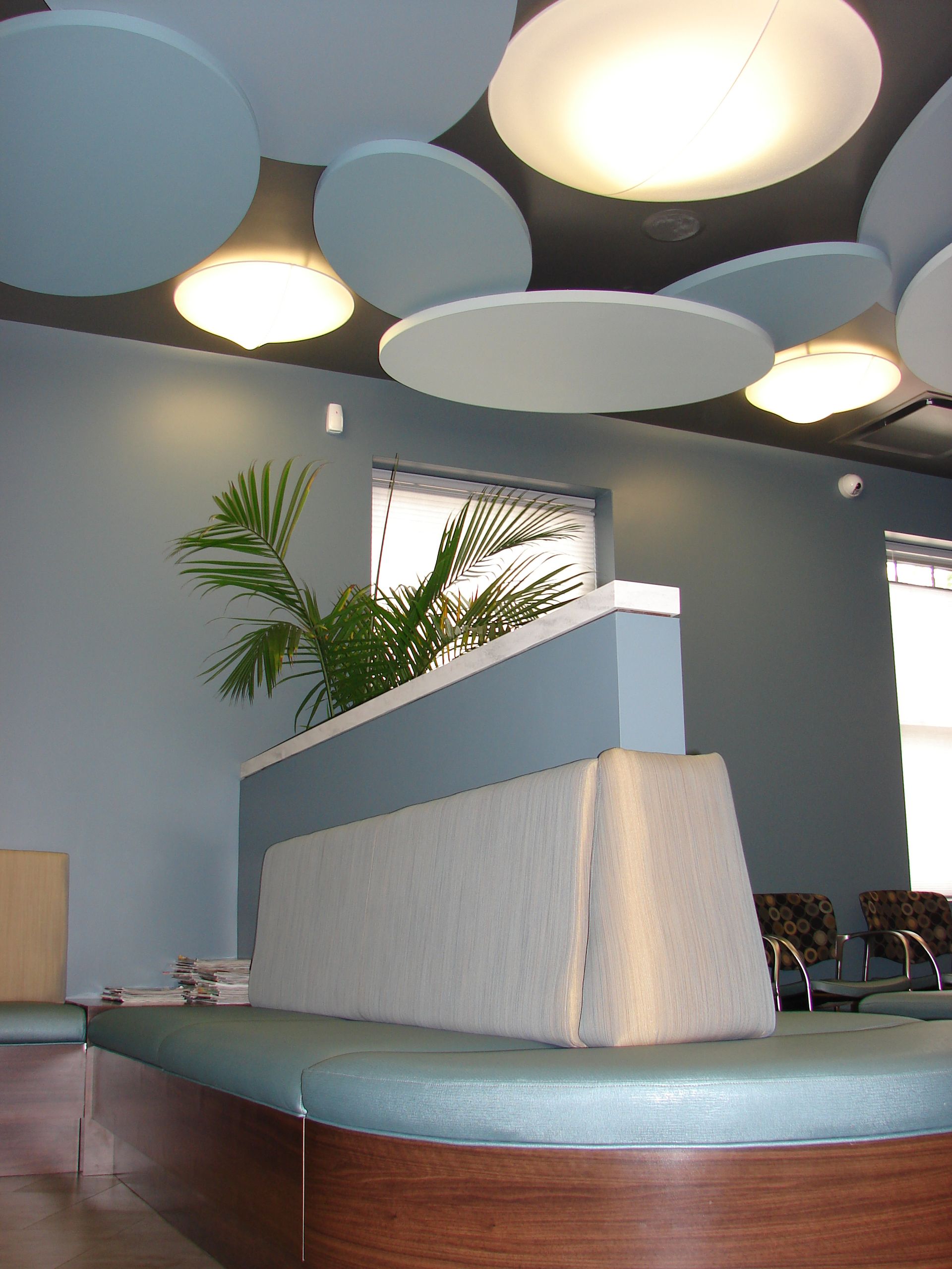 round bench and chairs in the waiting room