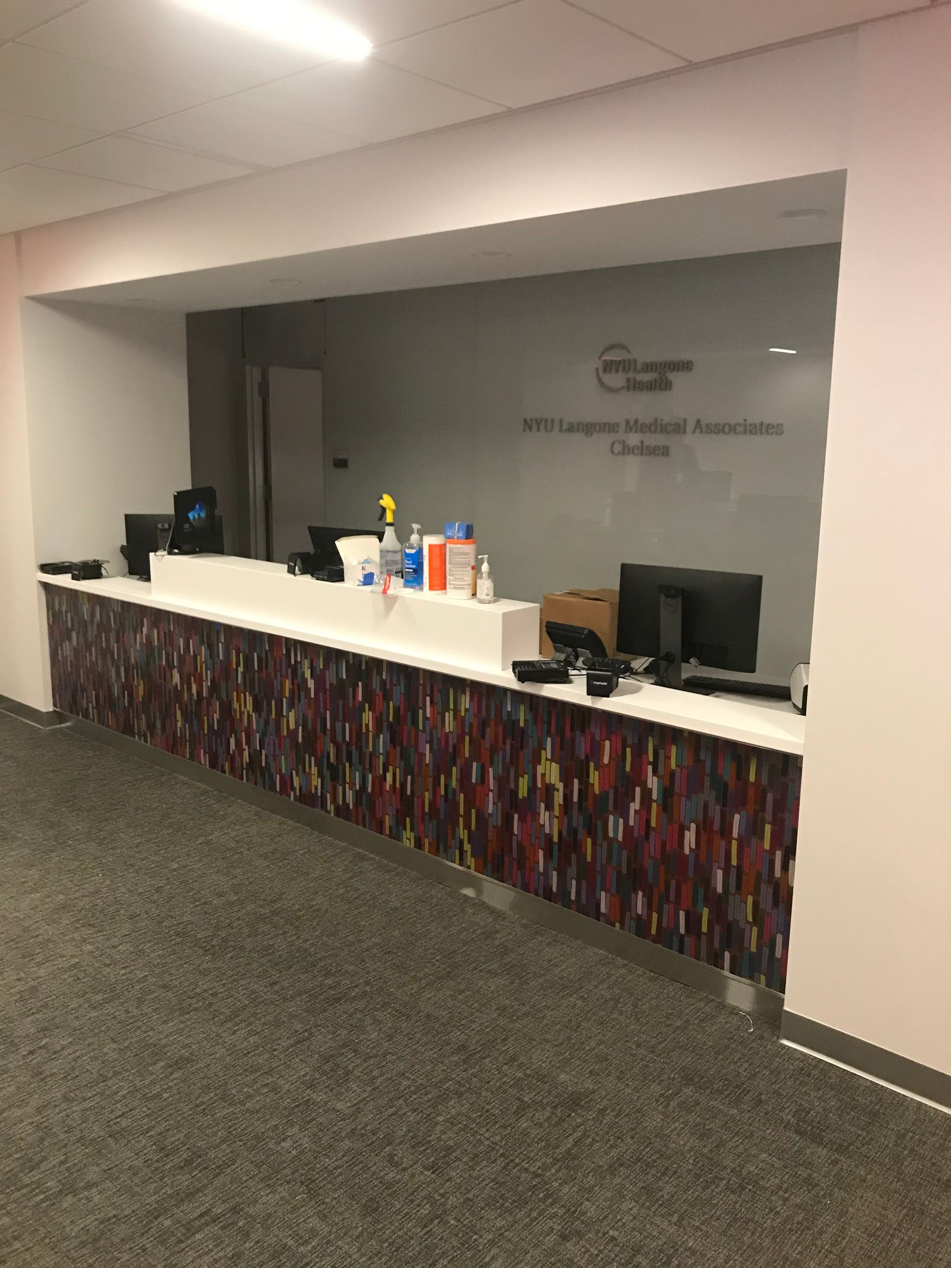reception desk with computer monitors
