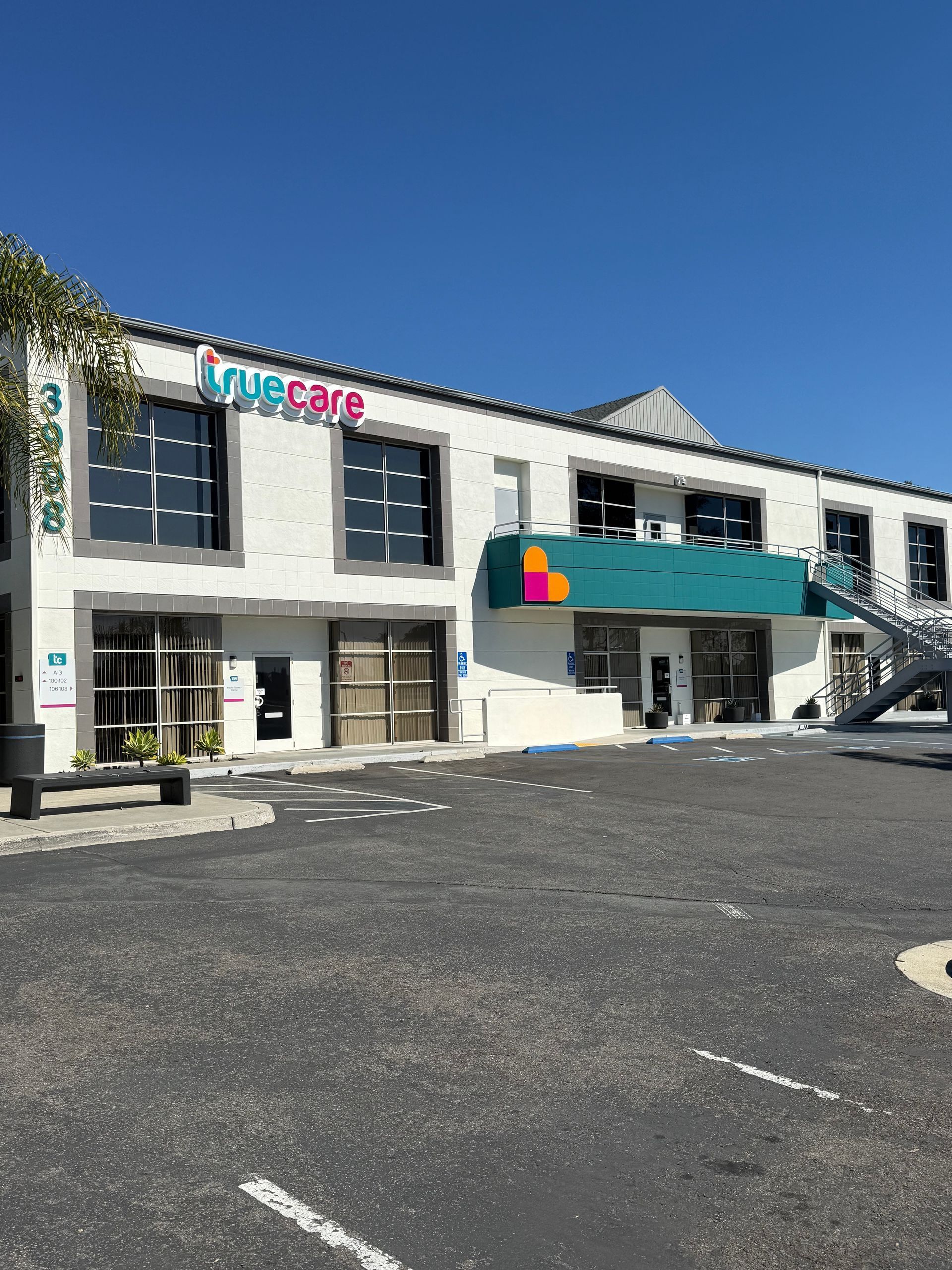 White, two-story building with 