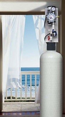 Beachfront oxygen tank by open balcony door with ocean view and white curtains