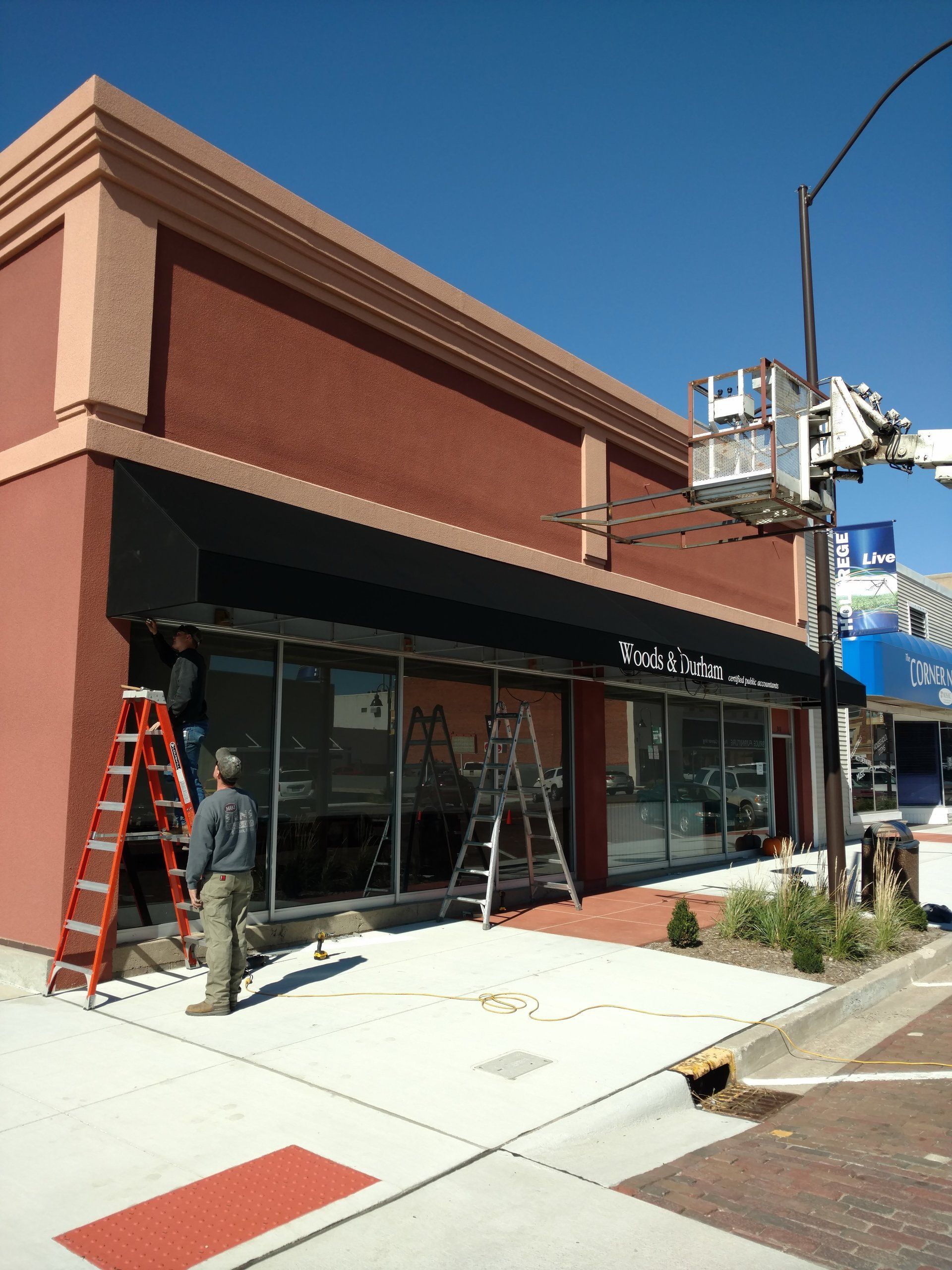 Building sign installation