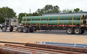 Truck loaded with pipes