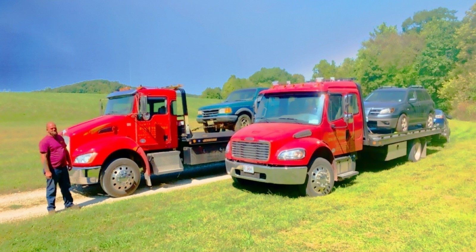 Two tow trucks