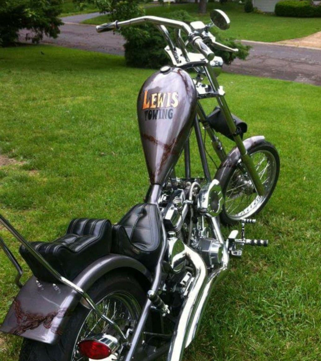 Lewis towing motorcycle