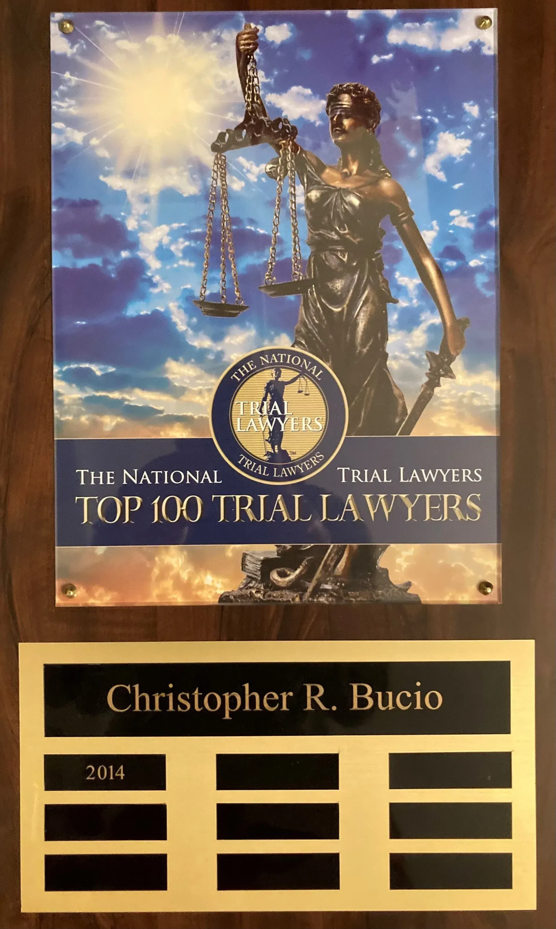 A plaque awarding Christopher R. Bucio 