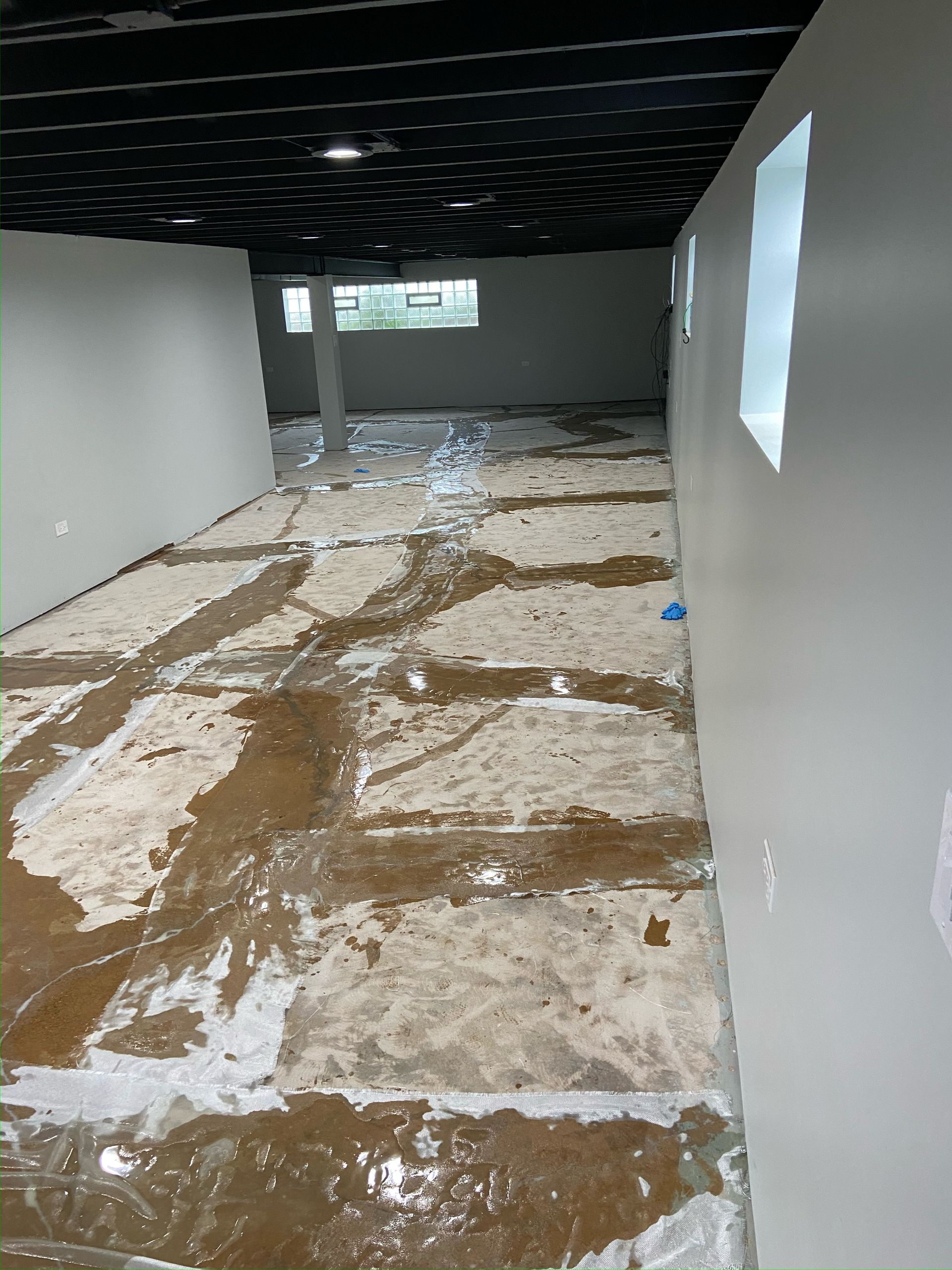 a room with a lot of dirt on the floor and walls