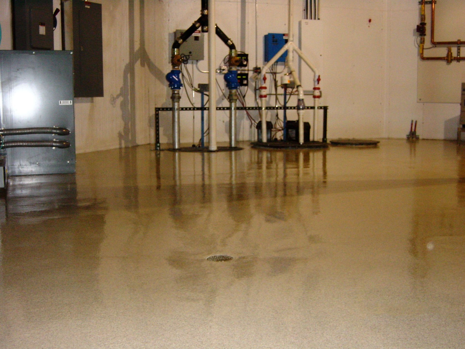 a room with a lot of pipes on the floor