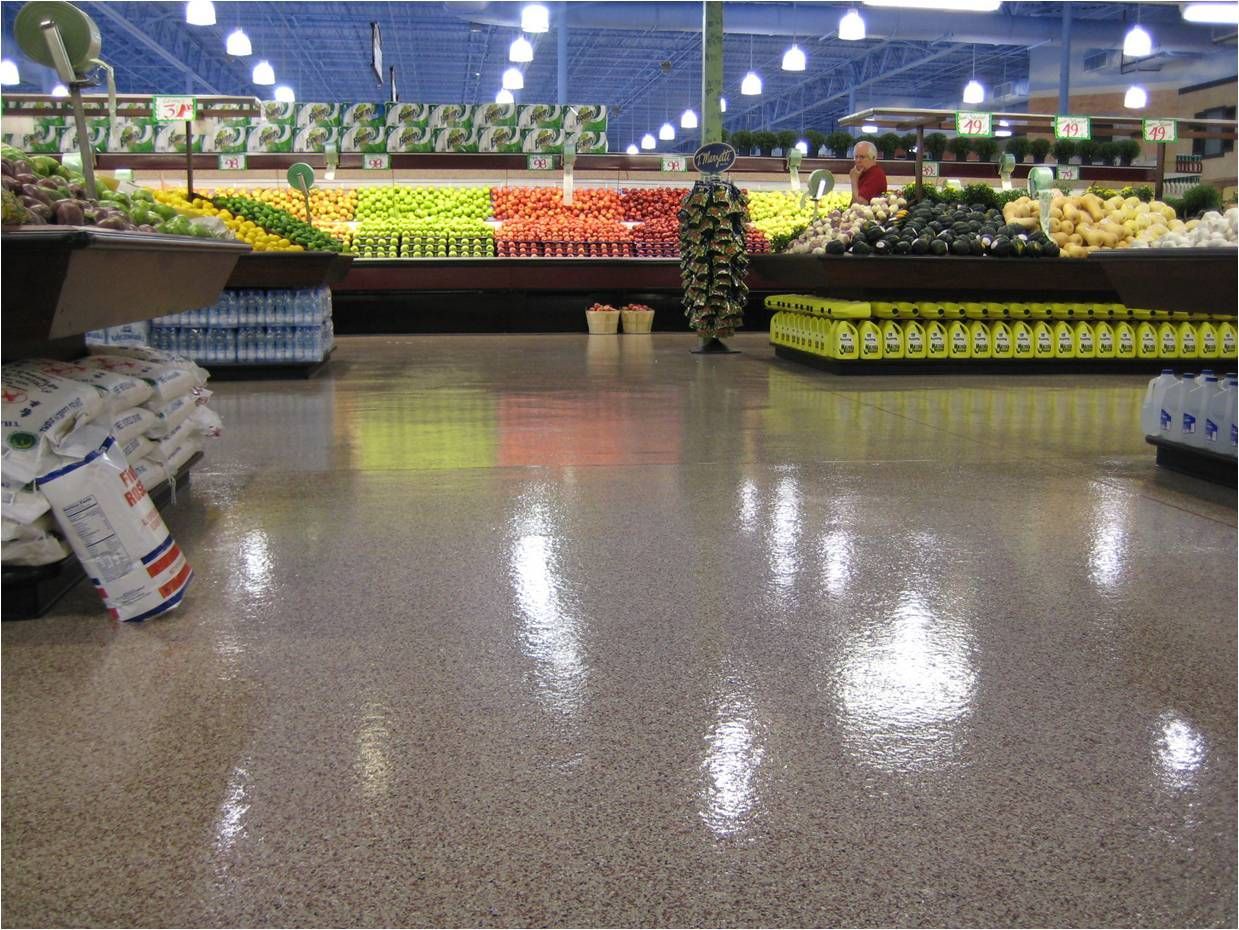 a grocery store with a display of fruits and vegetables