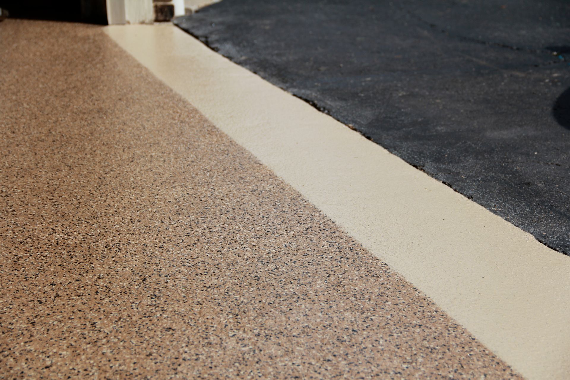 a close up of a concrete floor with a white border