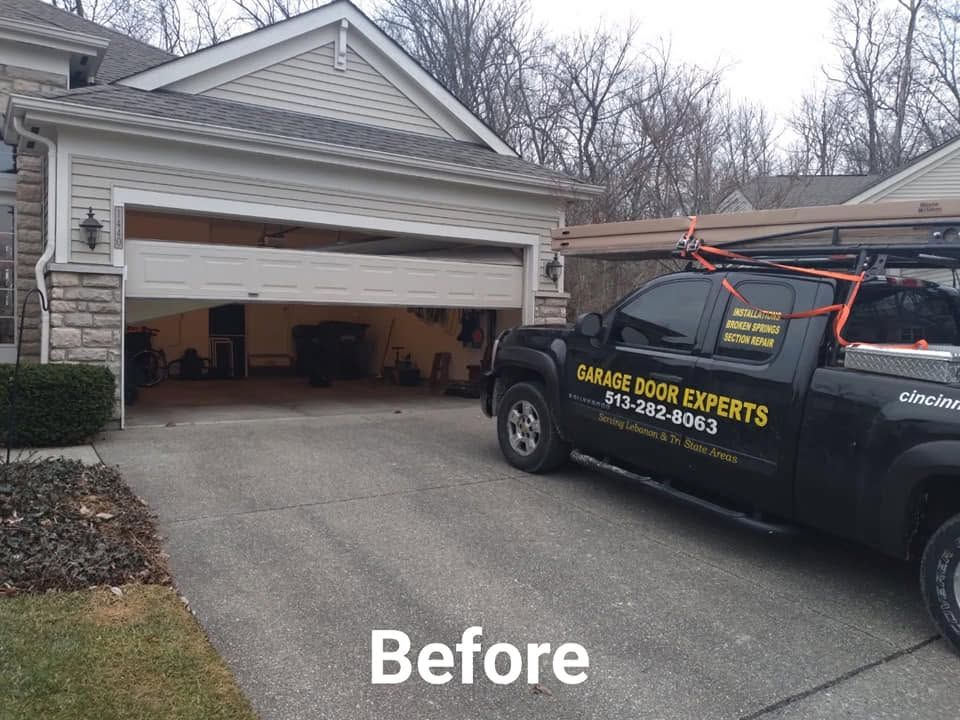 Before: black service van parked beside a partially open garage at a suburban home.