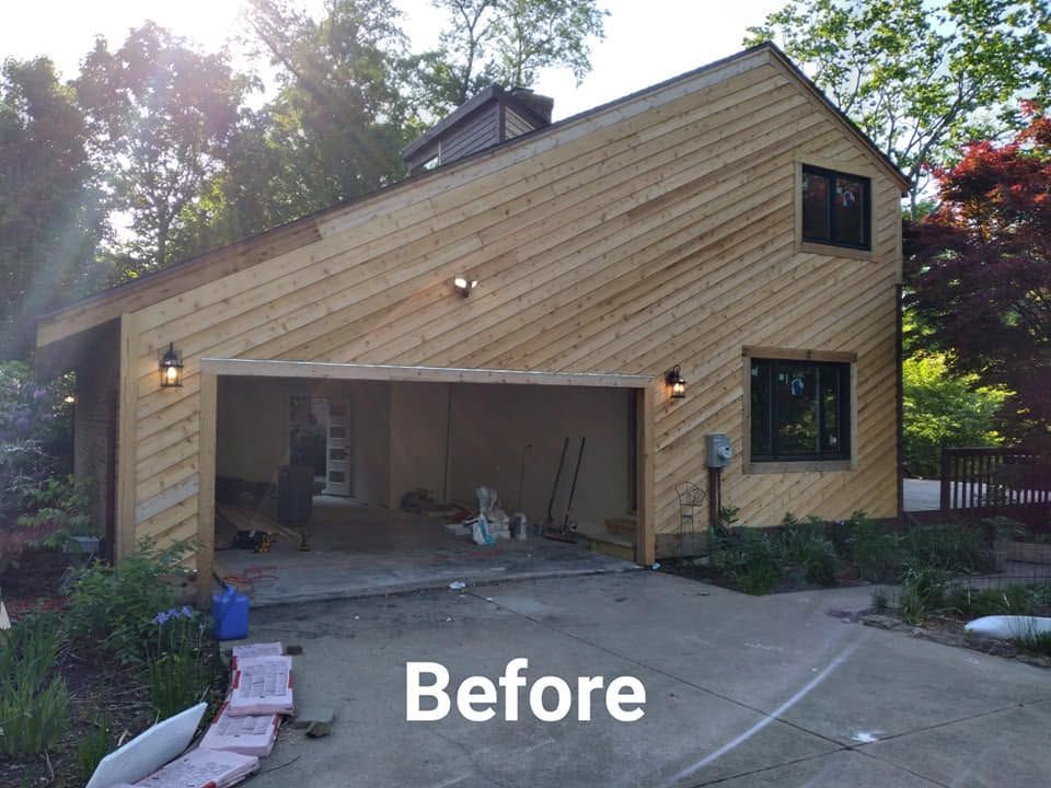 Wood-sided house with open garage and concrete driveway, labeled “Before”