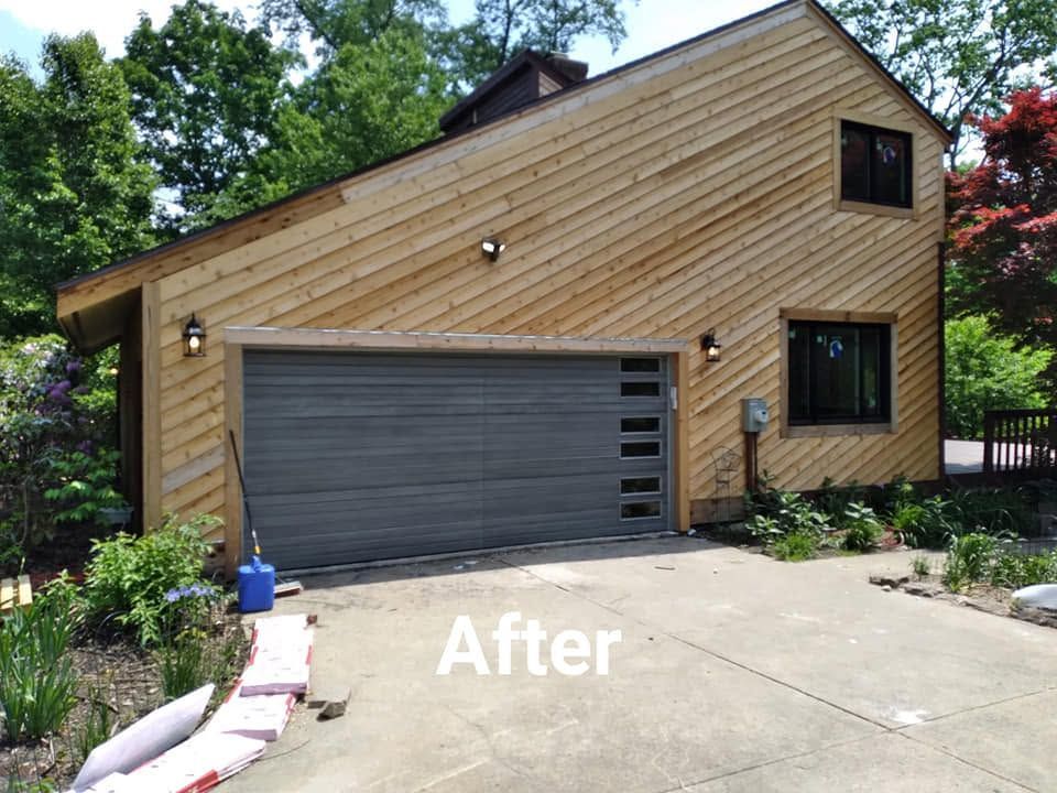 Exterior of a house with wood siding, gray garage door, and driveway, labeled “After”