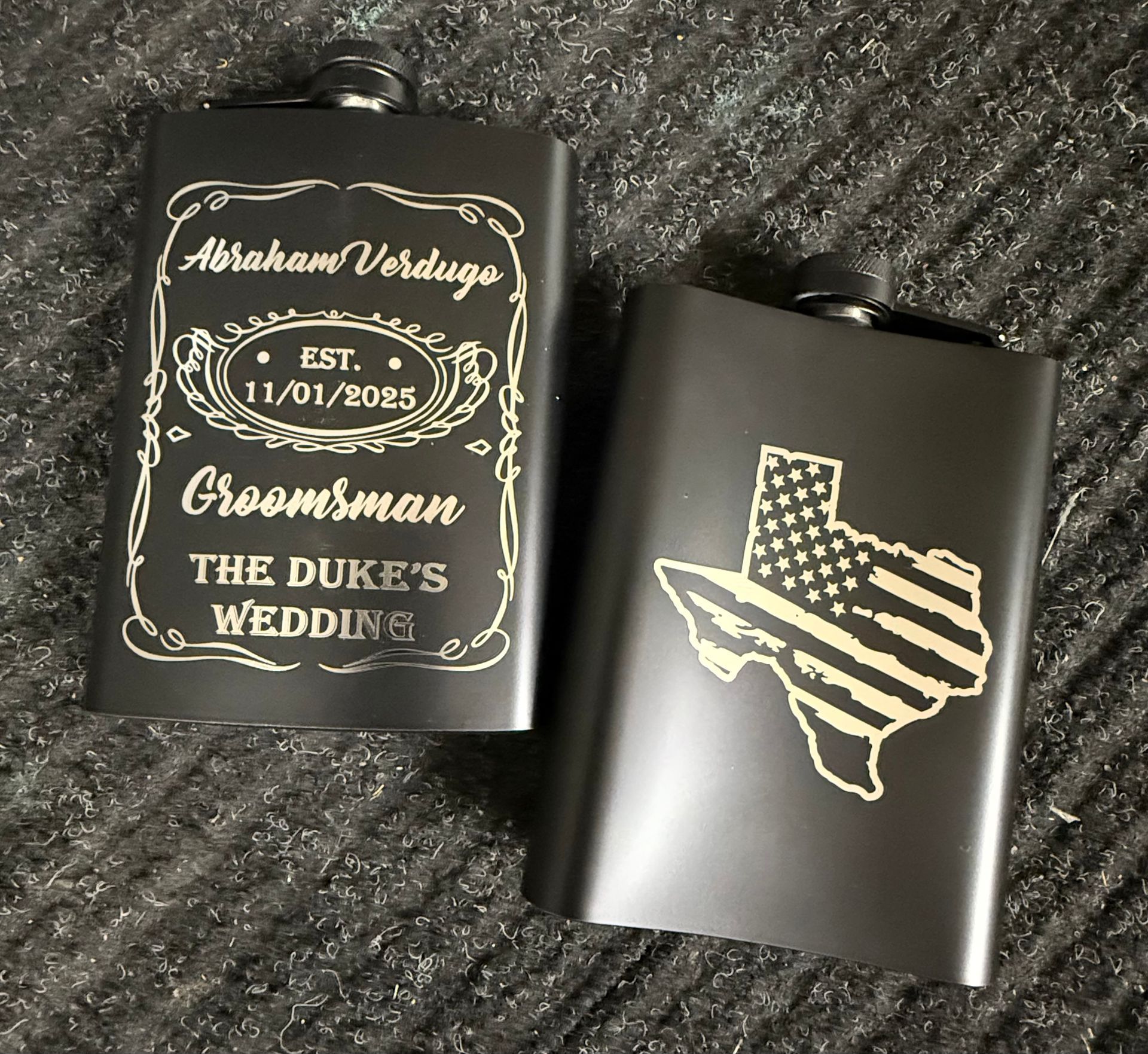 A flask with the name abraham verdugo on it