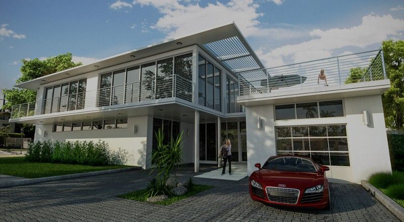 A red car is parked in front of a large white house