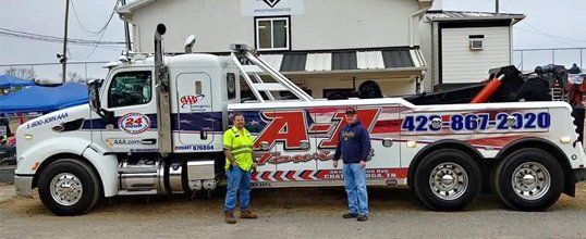 A1 Towing & Auto Repair truck and staff