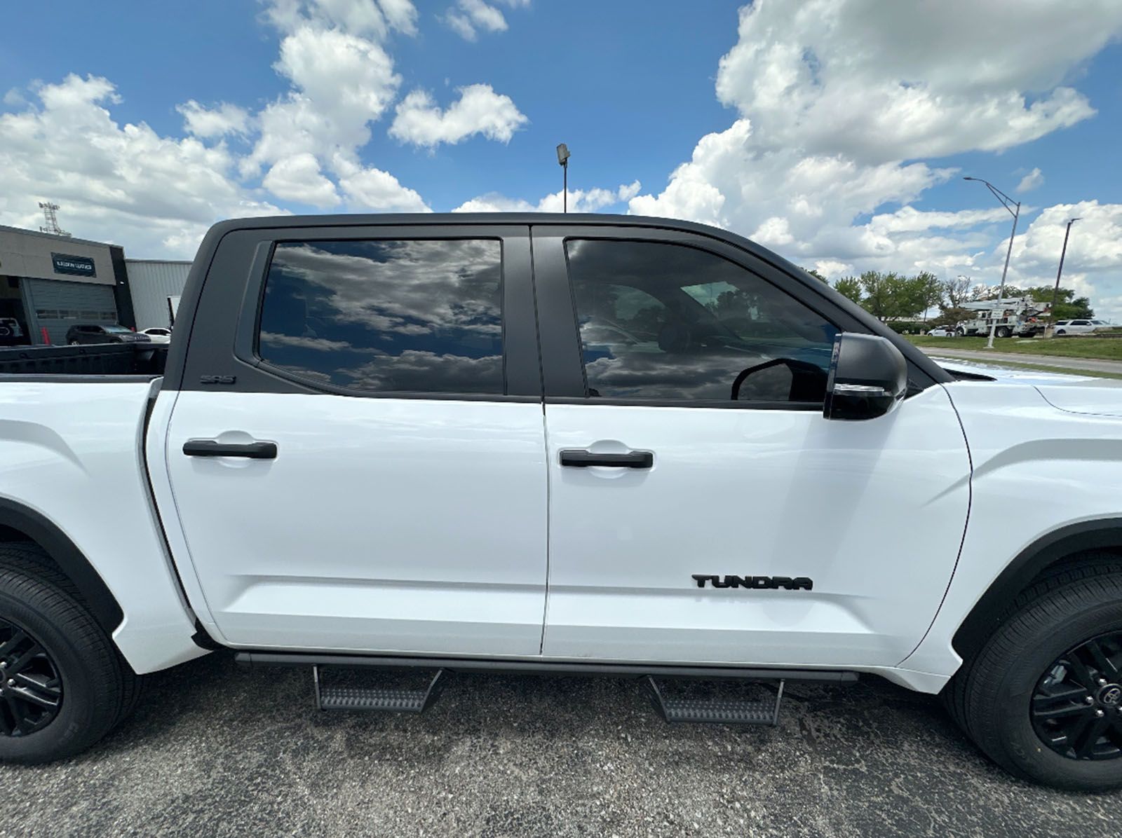 An elegant white truck with tinted windows
