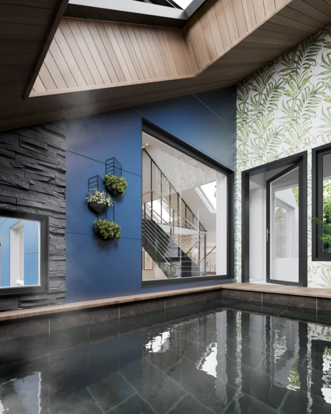 Indoor pool with dark water, stone tile, and blue walls. Window reveals stairs. Green leaf wallpaper.