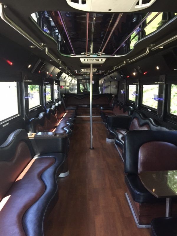 a white car is parked in front of a building