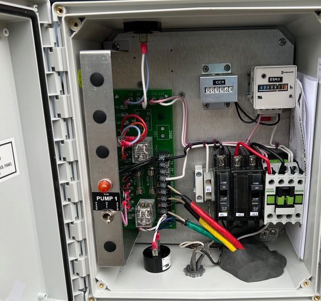 The inside of an electrical box with a sticker that says ' fuse 1 ' on it