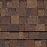 Brown asphalt roofing shingles in various shades.