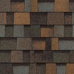 Brown, blue, and orange asphalt roof shingles, textured pattern.