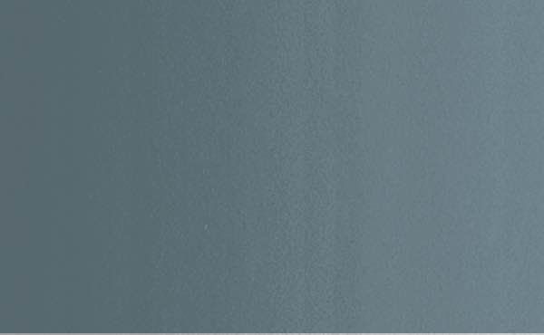 Blue-gray wall with slight texture.