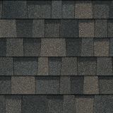 Dark gray and brown asphalt roof shingles.