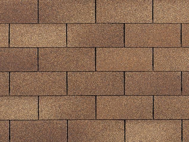 Brown asphalt roof shingles.