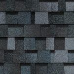 Dark gray asphalt shingles with a slight blue hue.