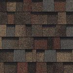 Roof shingles in shades of brown, red, and gray.