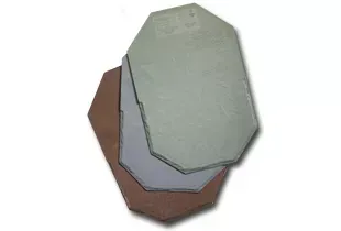 Three octagonal, layered ceramic plates, brown, gray and green, stacked on a white surface.