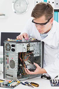 Technician repairing a CPU