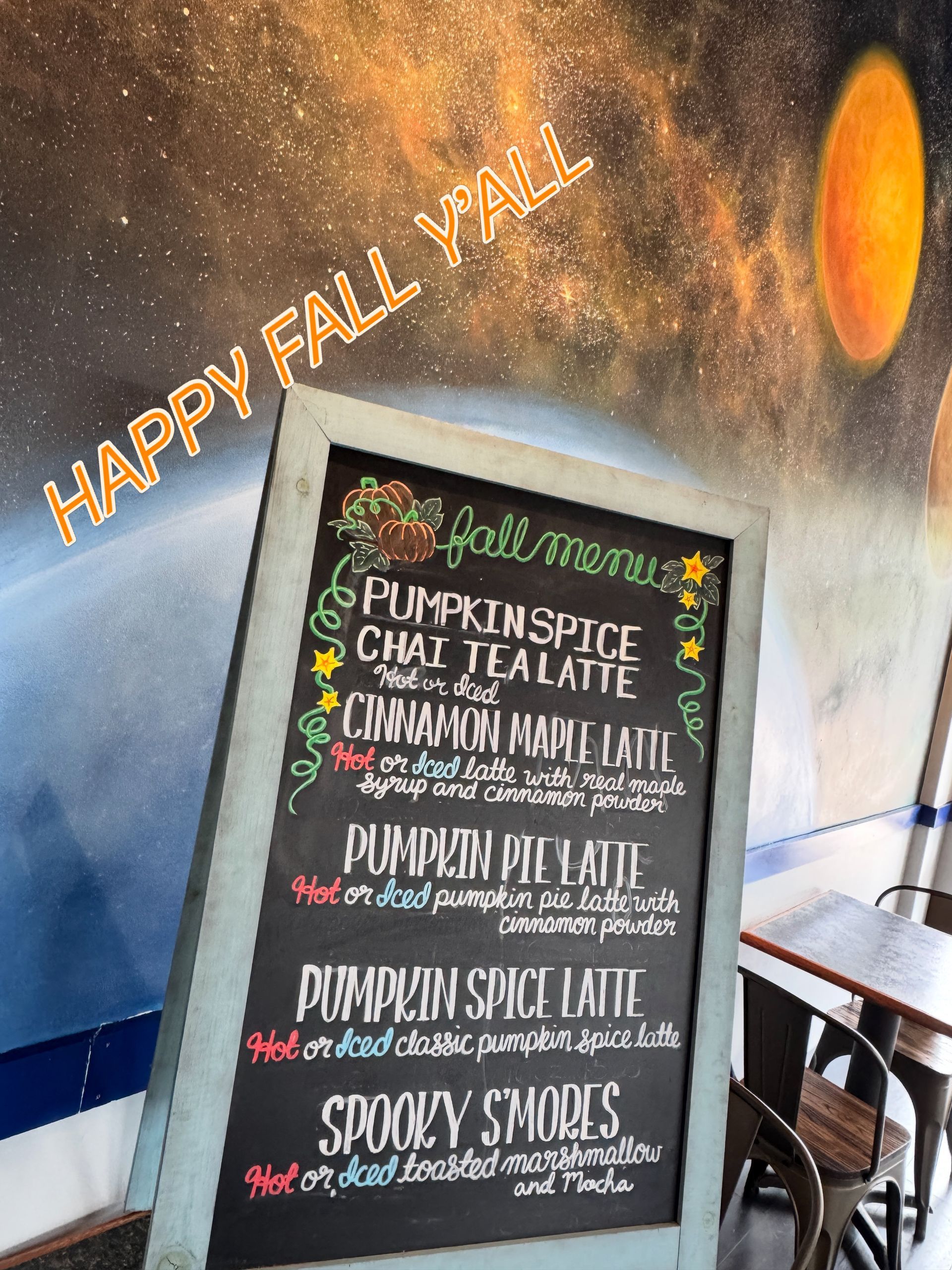 Fall decor with “Happy Fall Y’all” and a coffee shop menu board listing seasonal drinks