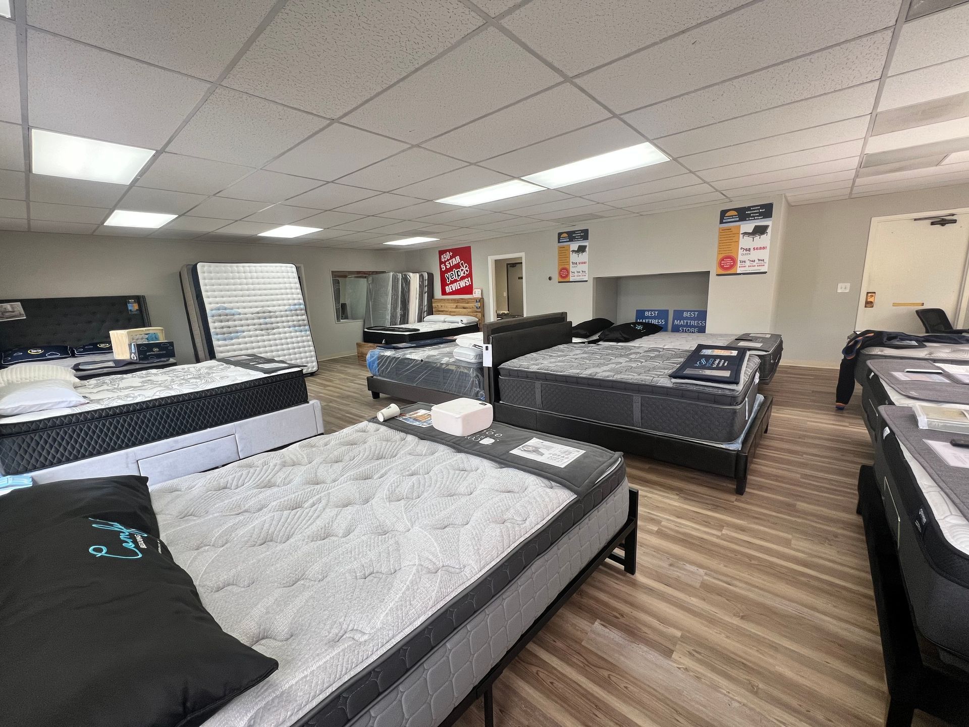 A mattress is sitting on top of a bed frame.