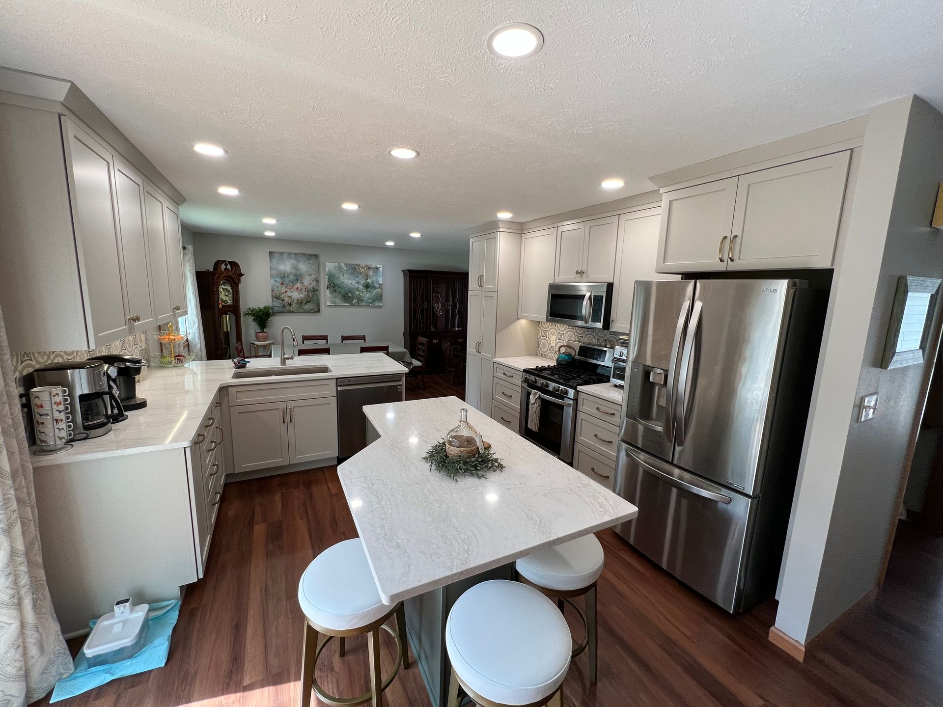 Kitchen with white cabinets and a white countertop