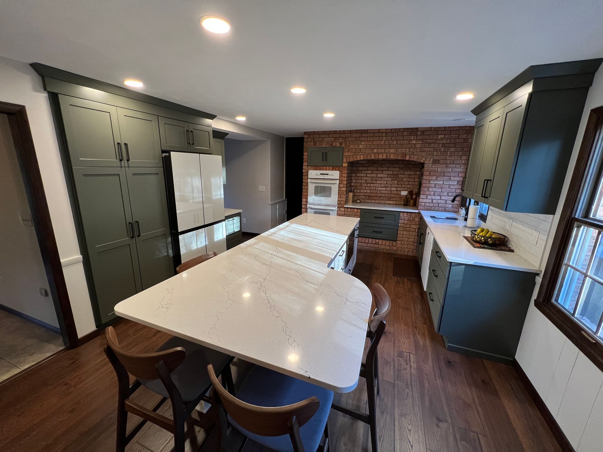 Kitchen with wooden cabinets and a table