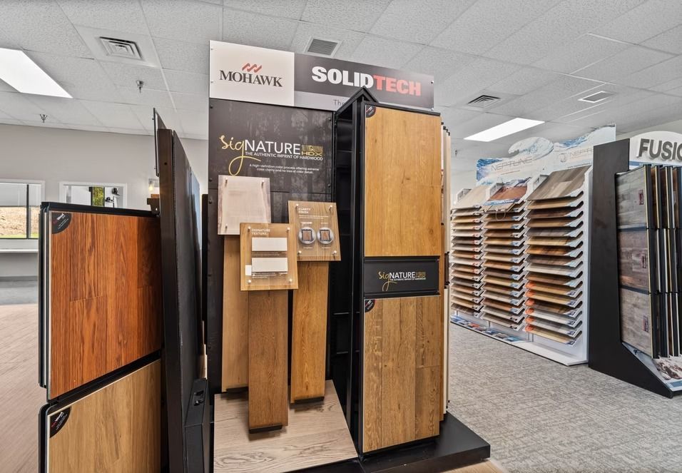 Showroom display of wood-look doors and panels with signage in a retail store