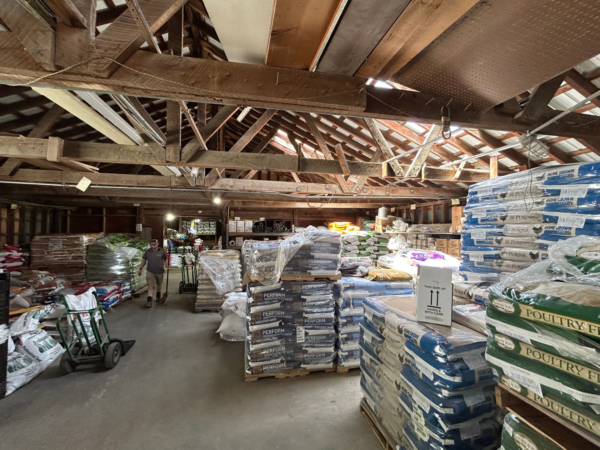 A large warehouse filled with lots of bags and boxes