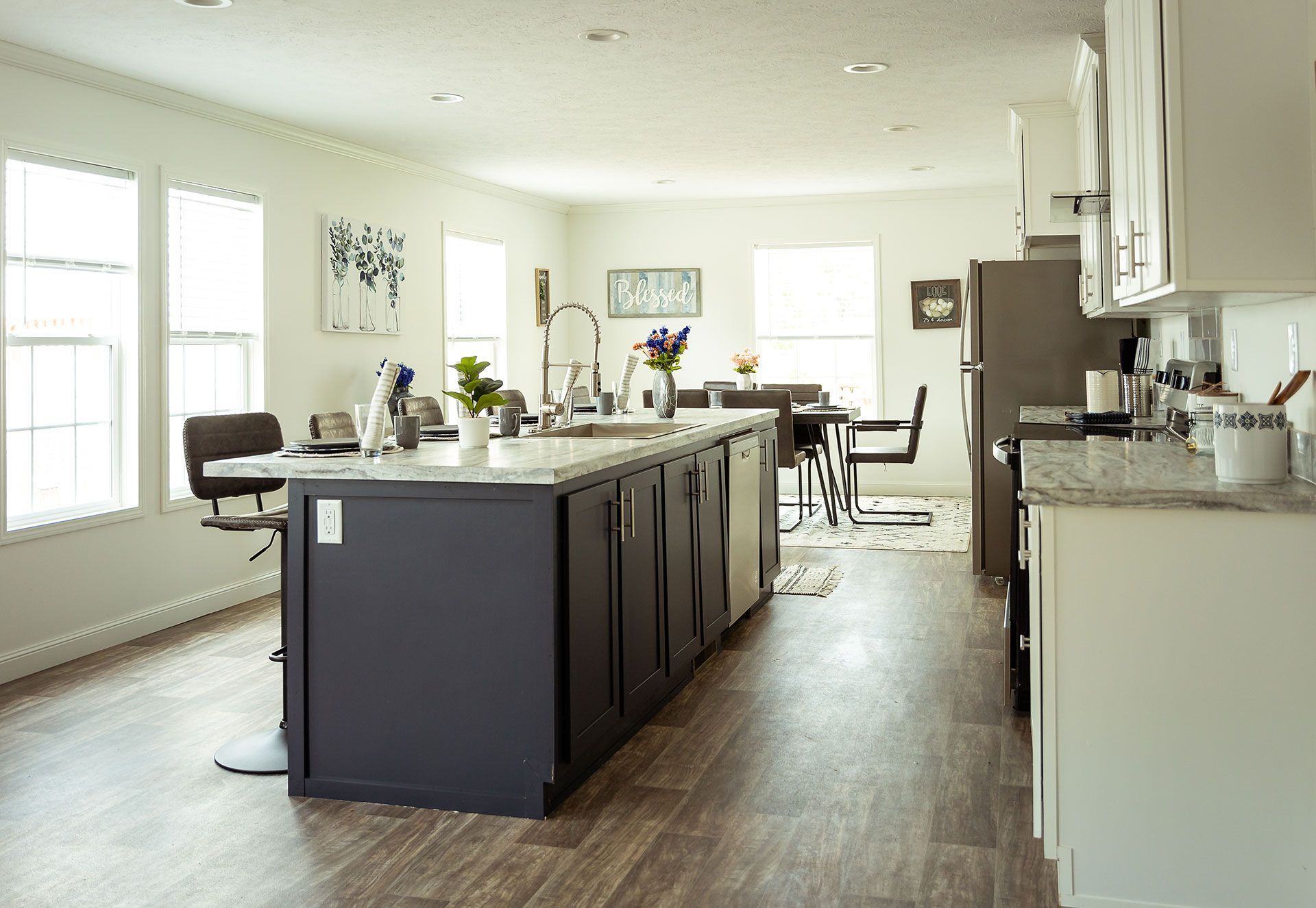 There is a large island in the middle of the kitchen