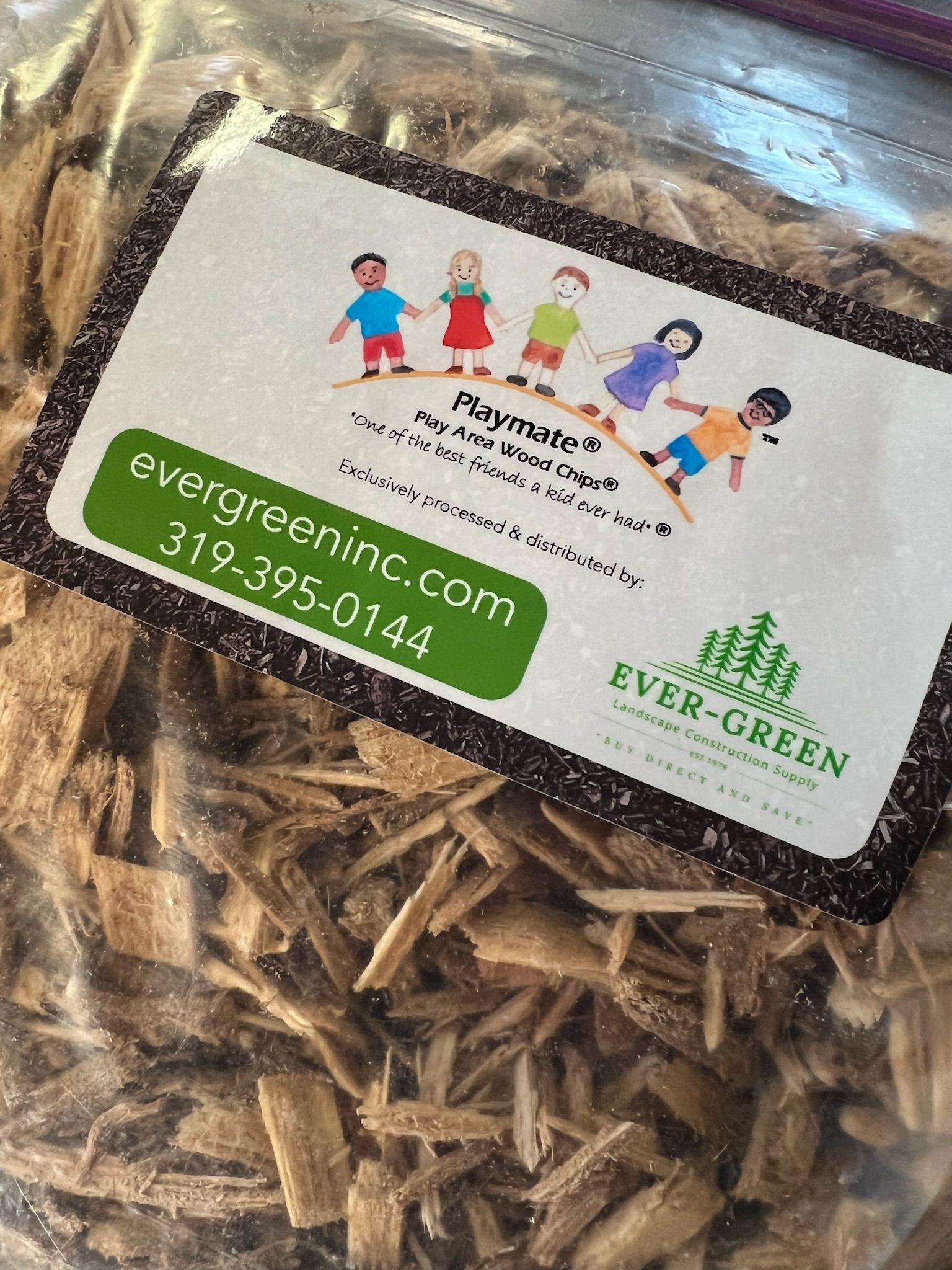 Bag of wood chips with a label for 