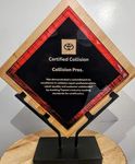A plaque that says certified collision collision pros