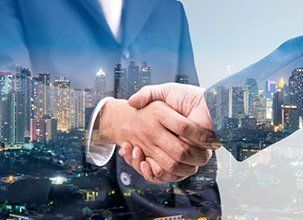 Learn More About Bilardo & Associates, LLC Shaking of hands between professionals