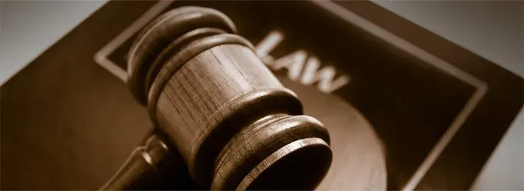 Gavel on a law book, symbolizing justice or a legal ruling