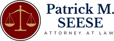 Patrick M. Seese Attorney at Law logo with scales icon in red and navy
