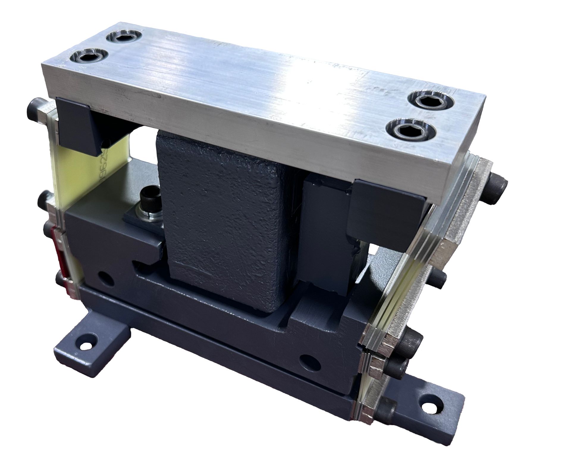 Small black-and-silver mechanical device with metal frame, mounted on a base, shown against a white background