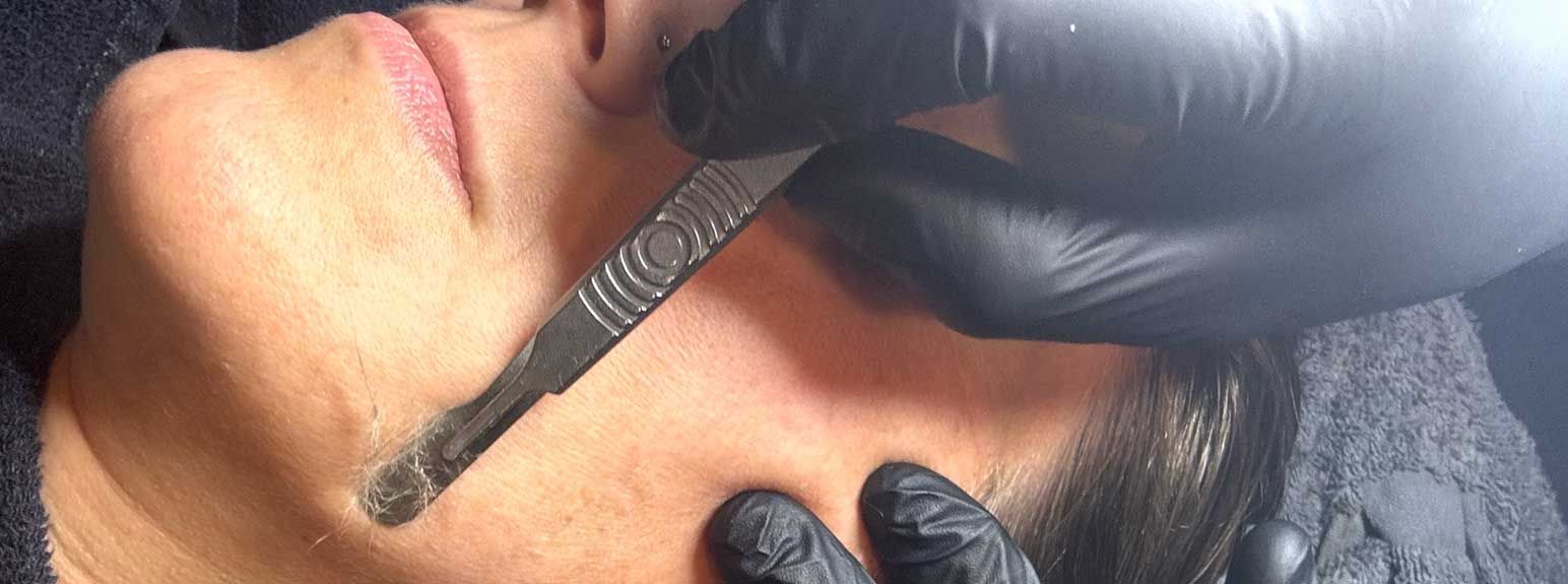 a person having a facial